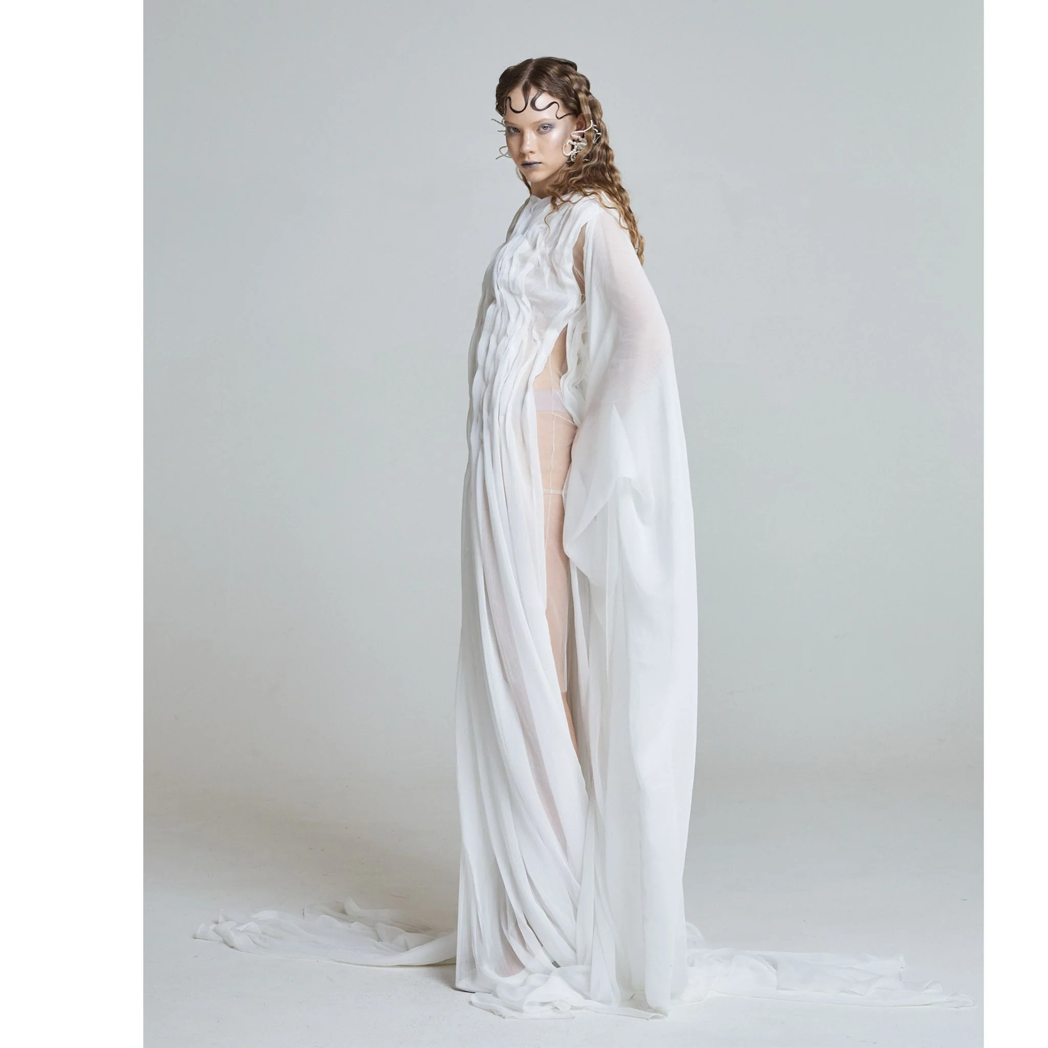 Wave Sculpture Gown in White - Image 4